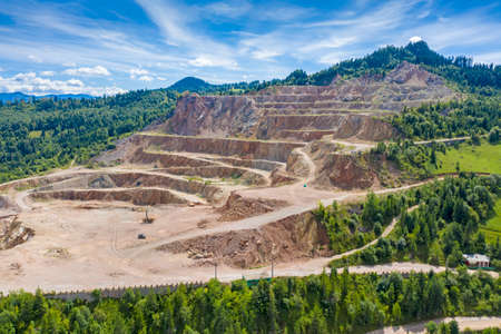 Cement mining quarry, aerial view in Romanian Carpathians