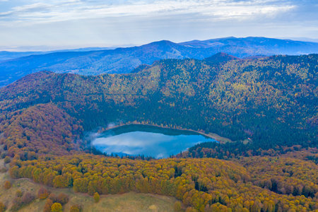 Forest lake during autumn viewed from above. Saint Anne Lake is the only one crater lake from...