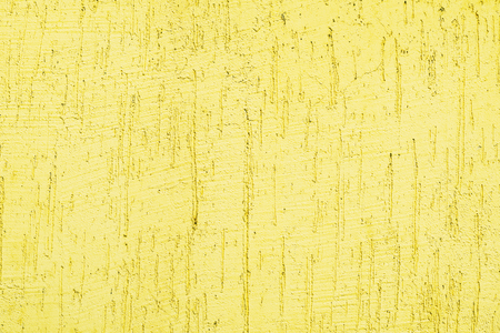 Yellow wall background. Texture of old plaster wallの写真素材