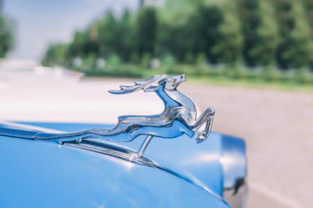 Bishkek, Kyrgyz Republic - May 9, 2018: Deer sign of retro car GAZ of time from USSR