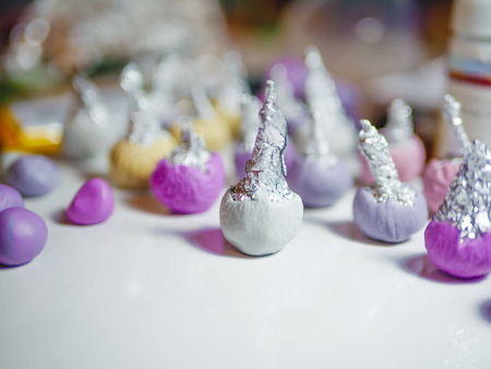 Few buds of polymer clay on the table for handmade craft in the home workplaceの写真素材