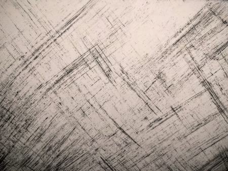 creatively scrawled white wall. Abstract of The Kid random drawing lines and patterns on a white table.の写真素材