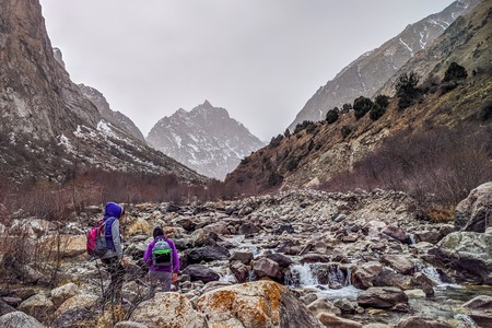Hikers in the mountains. Hiking team in the mountains. travel sport lifestyle concept.の写真素材
