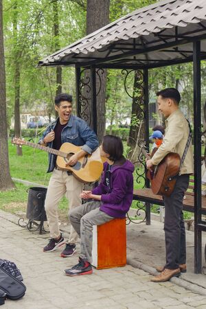 Bishkek, Kyrgyzstan - April 14, 2018: The festival music band performs on the street during the carnival.のeditorial素材