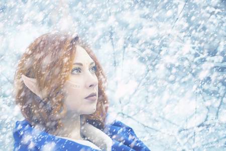 Elf Fairy woman. Elf the princess in the Christmas winter. The concept of fairy-tale characters. Copy spaceの写真素材
