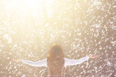Portrait of a woman in nature on a winter day.の写真素材
