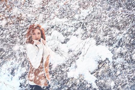Portrait of a woman in nature on a winter day.の写真素材