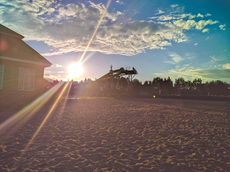 Beach cottage on sunset background.  Beautiful cottages at sunset on  Beach.の写真素材