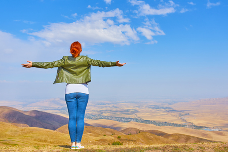 Freedom concept. Free Beauty woman outdoors enjoying nature mountains. Freedom conceptの写真素材