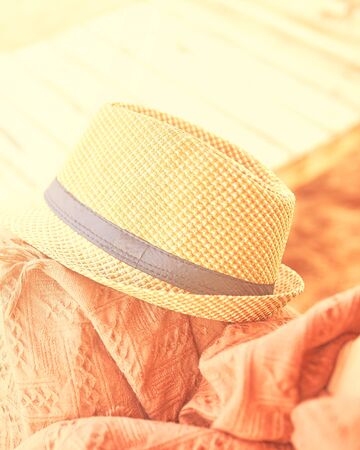 Straw hat on a hot day off.の写真素材