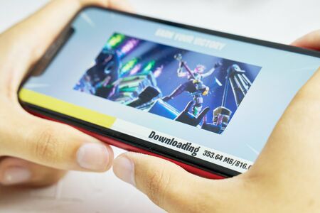 Bishkek, Kyrgyzstan - June 06, 2019: Downloading screensaver. Downloading for update on fortnite.のeditorial素材