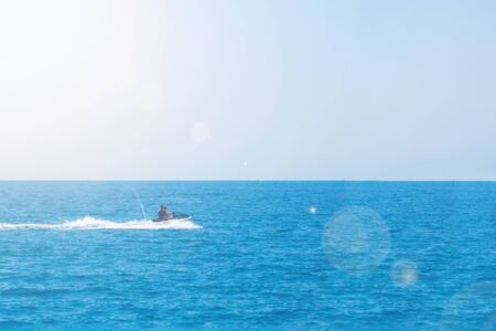 Jet ski in the sea on a Sunny dayの写真素材