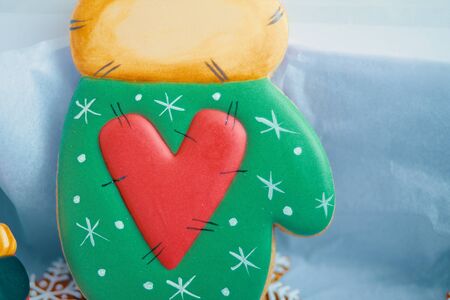 Valentine's day decor. Green cookie shaped like a glove.の写真素材