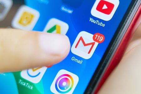 Bishkek, Kyrgyzstan - July 6 2019: Google Gmail application icon on Apple iPhone X smartphone screen close-up. Gmail app icon.のeditorial素材