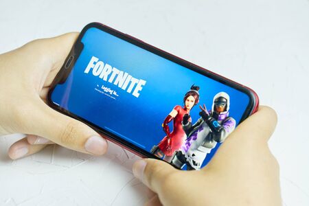 Bishkek, Kyrgyzstan - June 06, 2019: Downloading screensaver. Fortnite download logo.のeditorial素材