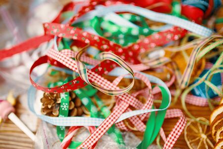 Christmas time. Process of packing gifts for holidaysの写真素材