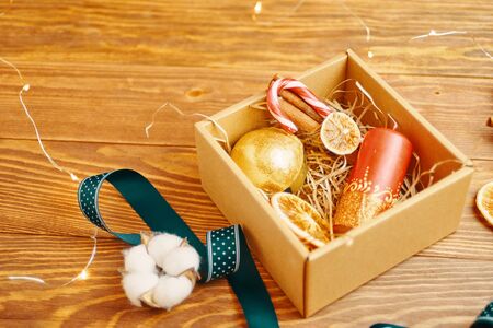 Christmas time. Process of packing gifts for holidaysの写真素材
