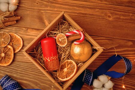 Christmas time. Process of packing gifts for holidaysの写真素材