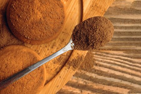 A pile of cookies and a spoonful of cocoa. Macroの写真素材