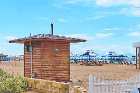 Creative wooden beach toilet near the resort hotelの写真素材