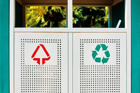 Trashcan in park. Iron canister, for the processing of debris is in the alley. Close-up.の写真素材