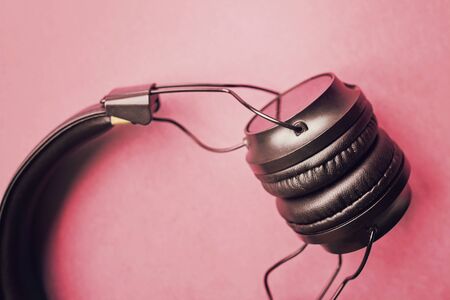 Wireless Headphones on colorful pink background. Top VIewの写真素材
