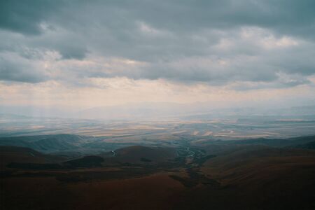 Mountains. Field of hills in cloudy weather. Happy international mountain day.