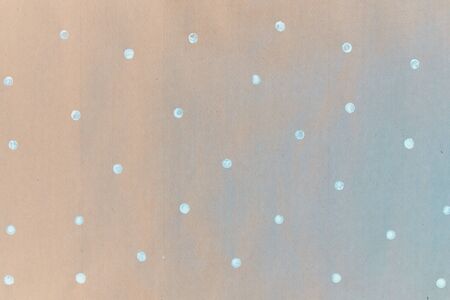 Gift wrapping paper texture. Painted paper, concept of small white dots, snowflakes.の写真素材