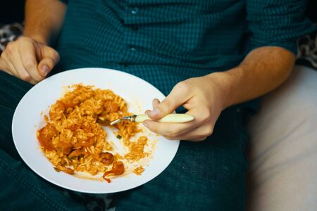 Man eats. Human eats lunch after work.