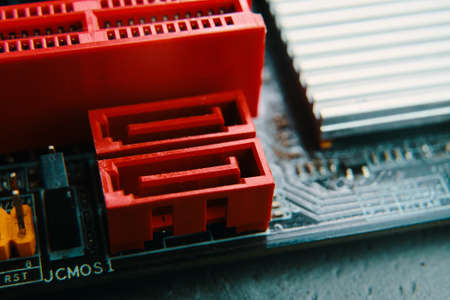 Bishkek, Kyrgyzstan - June 28, 2019: Sata connector. Micro circuit motherboard.のeditorial素材