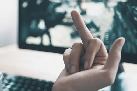 A simple hand gesture in gaming effectively conveys deep frustration and captures a truly genuine emotional momentの写真素材