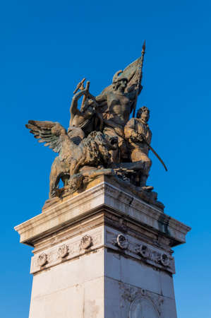 The sculpture of Action at the Altare della Patria or Vittoriano, Campidoglio, Rome. The characters...