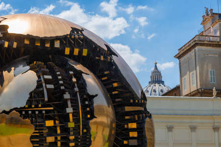 Sfera di Pomodoro, created by the sculptor Arnaldo Pomodoro, in the Cortile della Pigna, in the Vatican. Sphere within the sphere or Sphere with sphere. Vatican Museums Rome. Italy.のeditorial素材