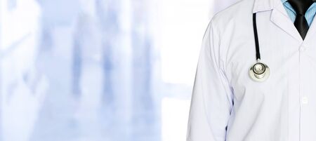 A doctor with stethoscope with copy space medical concept on blurredの写真素材