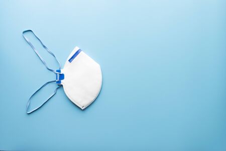 face mask N95 fomat on blue background protext covid-19の写真素材