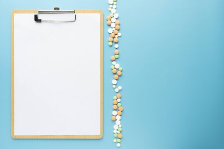 Stethoscope on blue  copy space for text.の写真素材