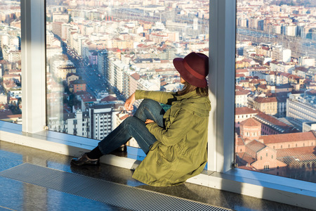Young woman looking the panorama of the city