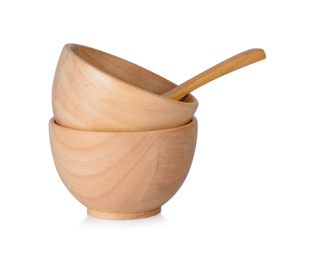 Cups and wooden spoons on white backgroundの写真素材