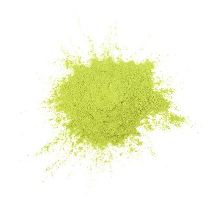 Green matcha powder on white background. Matcha made from finely ground green tea powder. Eat healthy because of high antioxidants.の写真素材