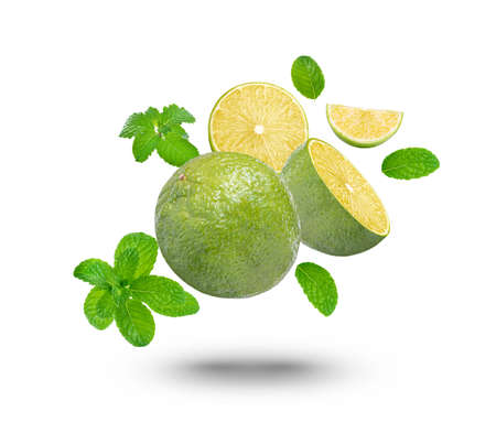 Fresh lime with mint leaves isolated on white background