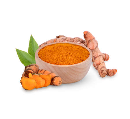Fresh turmeric with leaves isolated on white background
