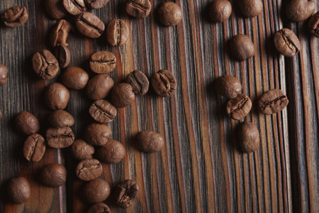 Coffee beans on wood background. Top view. Close upの写真素材