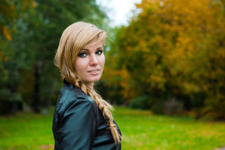 elegant woman in a landscapeの写真素材
