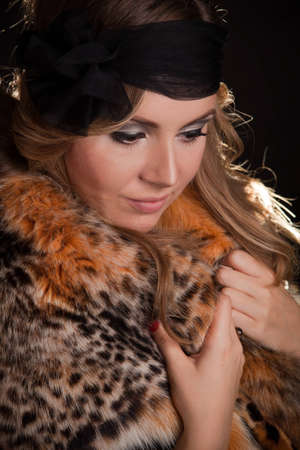 Young beautiful woman in black hatの写真素材