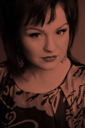 Close-up portrait of an elegant, dark-haired womanの写真素材