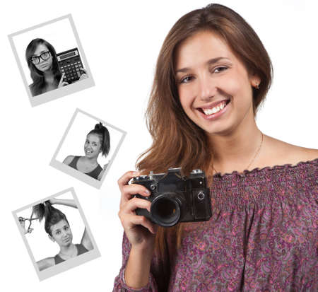 Young brunette girl with a cameraの写真素材
