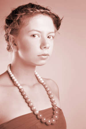 The beautiful girl with a plaitの写真素材