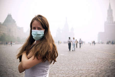 the girl in the mask is on a red square, strong managedの写真素材