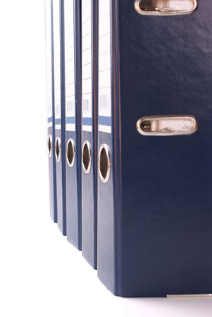 Some blue file folders standing vertically over whiteの写真素材