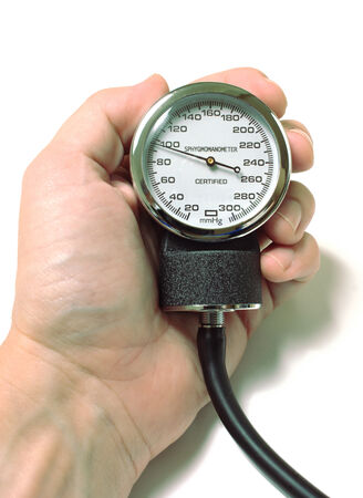 Male hand holding tonometer indicator